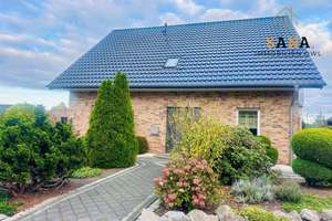 Einfamilienhaus im Klinkerstil mit Doppelgarage in Melle-Bennien – Die vollständige Adresse der Immobilie erhältst du vom Anbieter., 49328 Melle – Vorschaubild 2