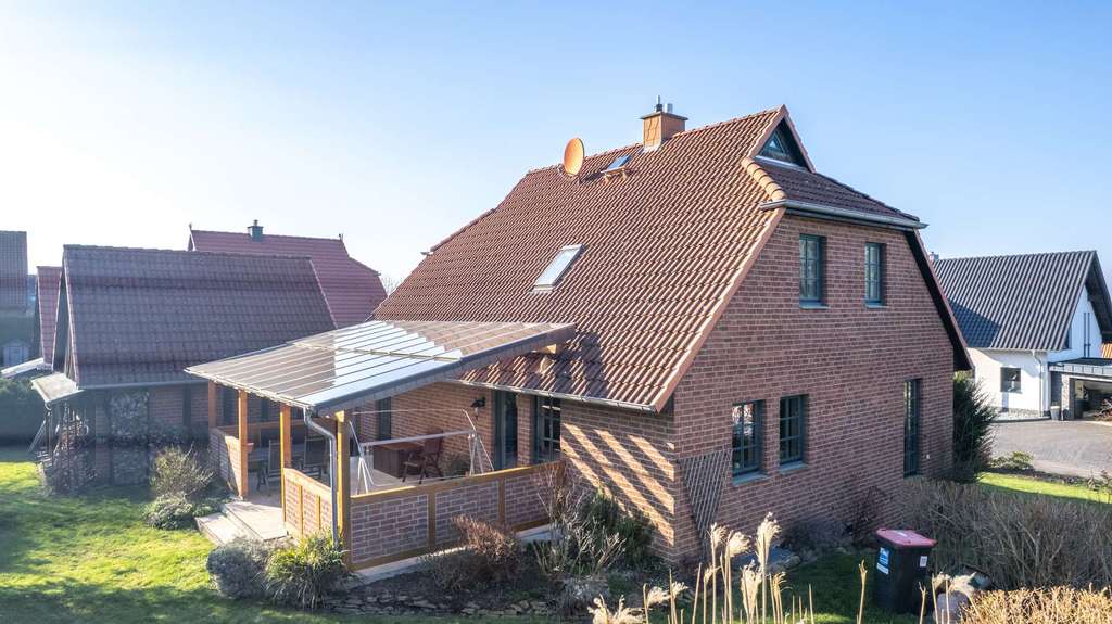 Immobilie in Nienstädt - Familientraum mit Gartenidylle – gepflegtes Einfamilienhaus mit Kamin, Terrasse und Doppelgarage - Bild 3