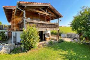 Holz, Licht, Lebensqualität. Einfamilienhaus mit unverbaubarem Blick in die Natur!