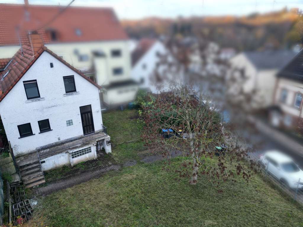 Immobilie in Schiffweiler - Kompaktes Einfamilienhaus mit Potenzial in ruhiger Lage von Schiffweiler - Bild 1