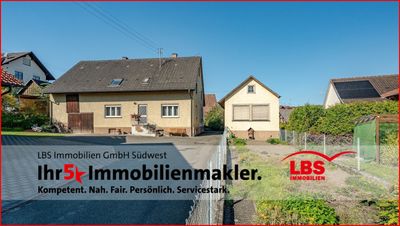 Viel Raum fürs Leben – Wohnhaus mit Werkstatt, Grundstück und flexiblen Nutzungsmöglichkeiten