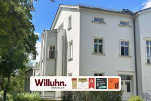 Charmante Denkmalwohnung mit Westbalkon l Aufzug | Tiefgaragenstellplatz optional