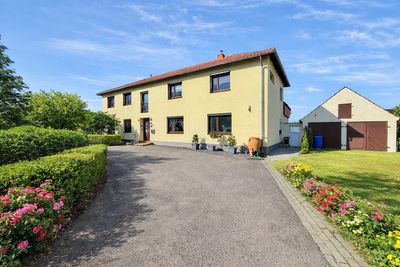 Großes Einfamilienhaus mit Einliegerwohnung in begehrter Lage