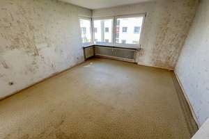 Handwerker aufgepasst! Zentral gelegene Wohnung mit Potenzial