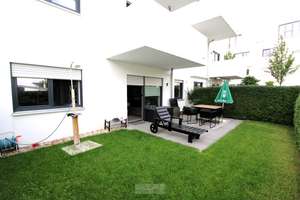 Neuwertige 2-Zimmer-Wohnung mit sonniger Terrasse und Gartenanteil