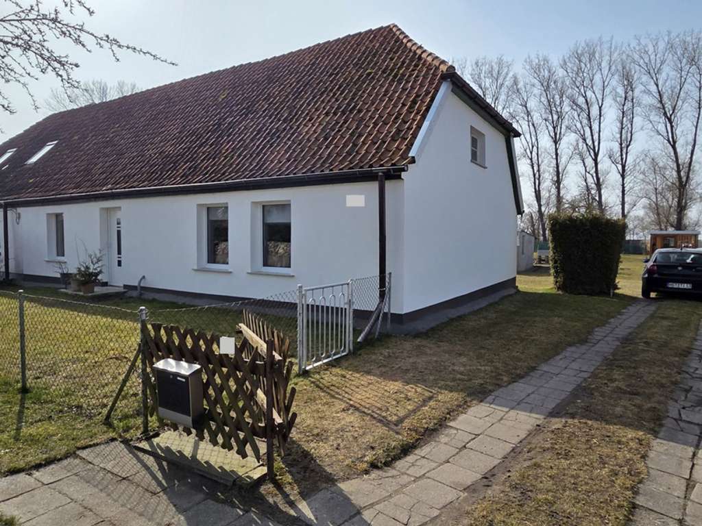 Immobilie in Altenpleen - Einmaliges Grundstück mit schöner und kuscheliger  DHH - Blick auf den Bodden - Bild 0