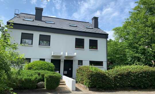 Charmante Doppelhaushälfte mit viel Platz, Garten & Garage