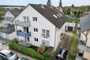 Attraktive Kapitalanlage in Neureut: Vermietetes Mehrfamilienhaus mit 8 Einheiten und Garagen