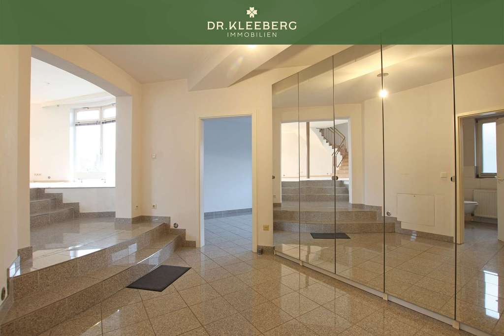 Immobilie in Nottuln - Architektonisches Highlight am Grüngürtel – Maisonettewohnung mit Runddesign in Nottuln - Bild 1