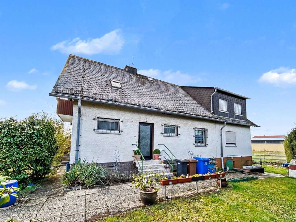 Immobilie in Selters (Taunus) - Gepflegtes, vermietetes EFH in ruhiger Lage und großem Grundstück in Haintchen-Selters - Bild 0