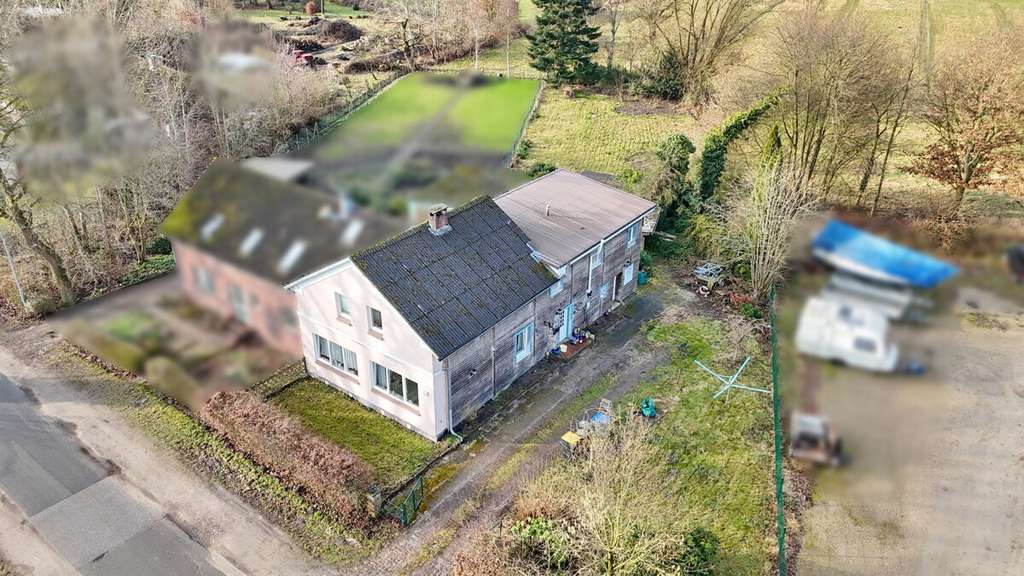 Immobilie in Heidgraben - Einfamilienhaus mit vielseitiger Nutzungsmöglichkeit auf großzügigem Grundstück in Heidgraben - Bild 2