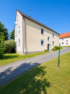Kapitalanlage mit Entwicklungspotenzial – Zwei Mehrfamilienhäuser auf großem Grundstück