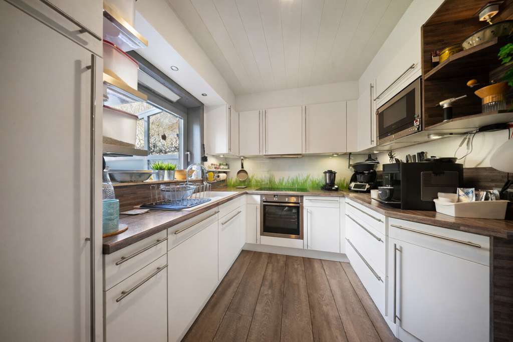 Immobilie in Barkelsby - Modernes Reihenmittelhaus mit Garten, Smarthome und Waldblick - Bild 1