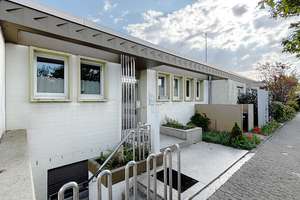 Architektenbungalow + Einliegerwohnung + separate Büroeinheit in Feldrandlage von DA-Arheilgen