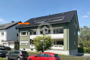 Vermietete Dachgeschosswohnung mit Entwicklungspotenzial in grüner Lage!