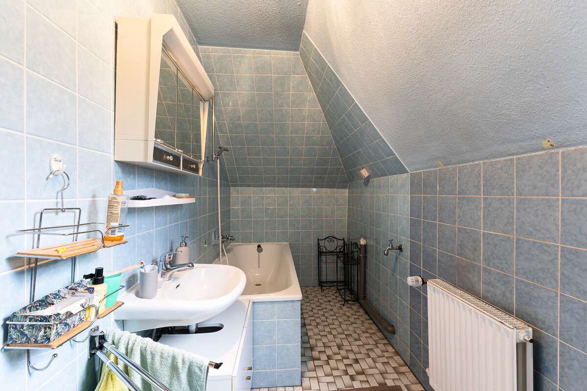 Immobilie in Hohenlockstedt - Charmantes Einfamilienhaus mit großem Garten, Keller, Garage & Carport für die Familie! - Bild 13