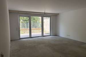 Exklusive Erdgeschosswohnung mit Terrasse und Gartenanteil – Erstbezug im KfW-40 Neubau