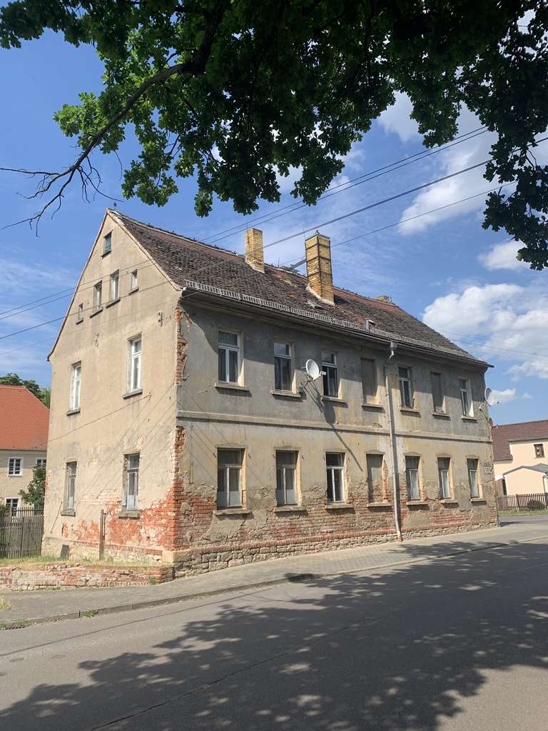 Mehrfamilienhaus in Schkeuditz OT Dölzig mit Grundstück