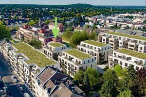 Stadtvilla: Helle 2-Zimmer-Wohnung mit komfortabler Einbauküche und Tiefgaragenplatz
