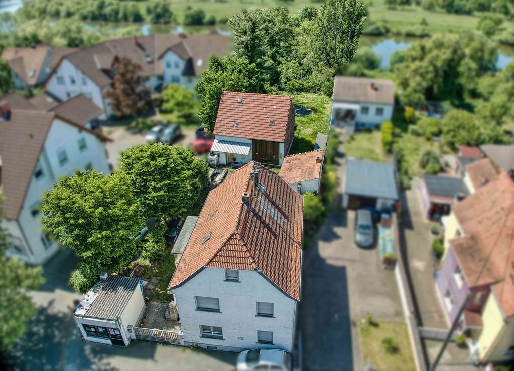 Immobilie in Karlstein am Main - Traumhafte Lage - Vielfältige Nutzbarkeit - Einfamilienhaus plus Baugrundstück direkter Mainzugang - Bild 0