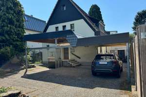 Großzügiges 2-Parteienhaus mit großem Grundstück, Terrasse & Wellnessbereich in Köln-Lövenich