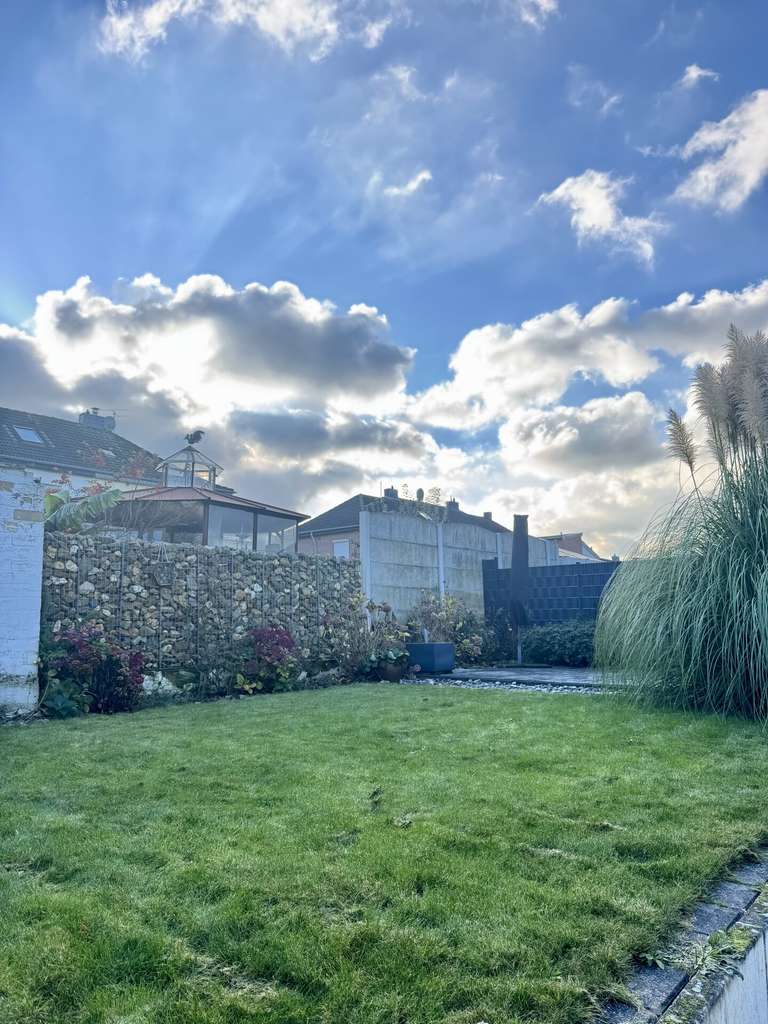 Immobilie in Übach-Palenberg - Mehr Raum für Ideen: Reihenmittelhaus mit Einliegerwohnung und Garten in Übach-Palenberg. - Bild 1