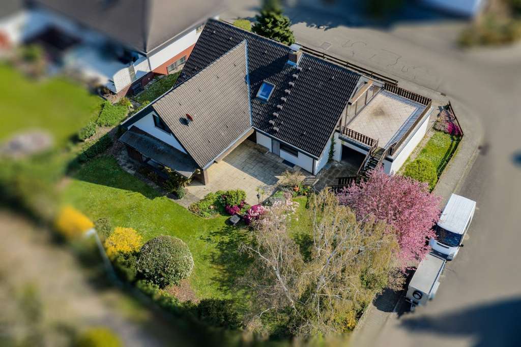Immobilie in Biblis - Einfamilienhaus in Biblis - Großzügiges Wohnen auf 203 m² mit viel Platz für die ganze Familie - Bild 0