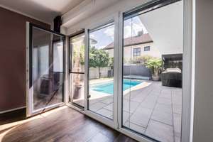 Design, Raum und Flexibilität – eine moderne Bauhausvilla mit Pool für alle Lebensphasen – Die vollständige Adresse der Immobilie erhältst du vom Anbieter., 81825 Gartenstadt Trudering, München – Vorschaubild 11
