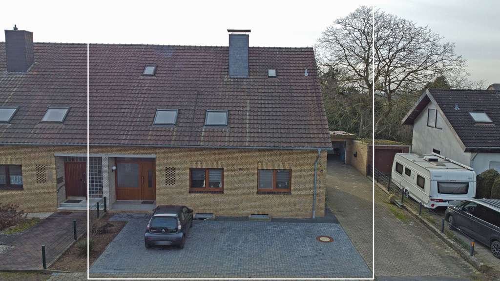 Immobilie in Voerde (Niederrhein) - Gepflegtes Zweifamilienhaus in Voerde-Spellen mit großem Grundstück! - Bild 1