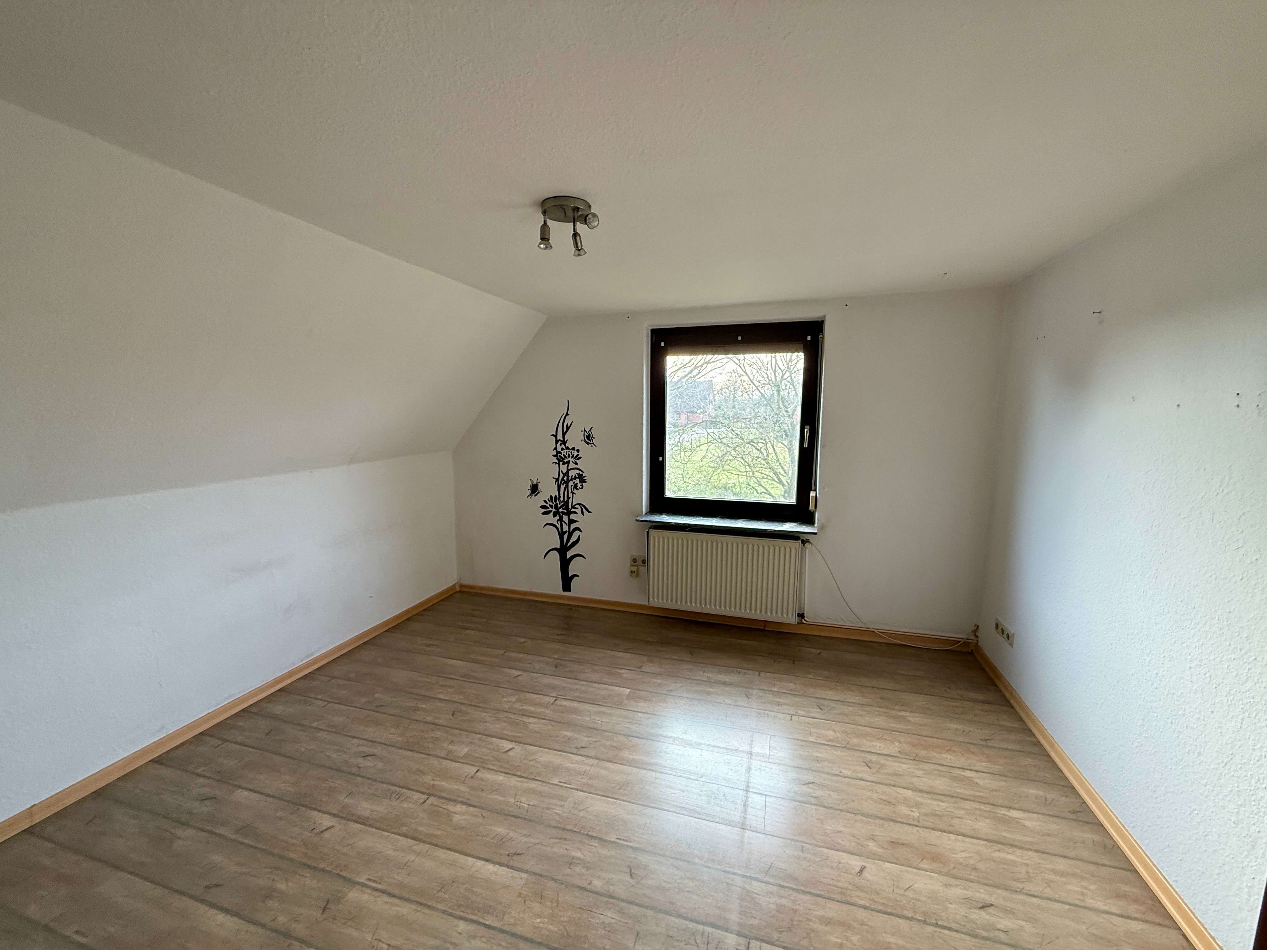 Immobilie in Wietzen - Modernisiertes Zweifamilienhaus mit Einliegerwohnung, Specksteinofen und PV Anlage in Wietzen! - Bild 15