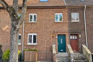 „Duisburg-Wehofen: Reihenmittelhaus mit Garten, offener Wohnküche und historischem Charme“