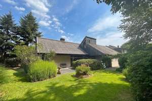 Architektonisch reizvolles Einfamilienhaus mit Galerie, Kamin und Garten in Nienberge!