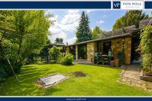 Attraktiver Bungalow mit rustikalem Ambiente und liebevoll angelegtem Garten