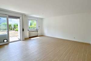 Sonnenverwöhnte renovierte 4-ZKB EG-Wohnung mit Terrasse, Garten und Garage