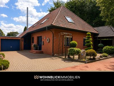 **Großzügiger Bungalow mit Wintergarten, Kamin & ausgebautem Obergeschoss**