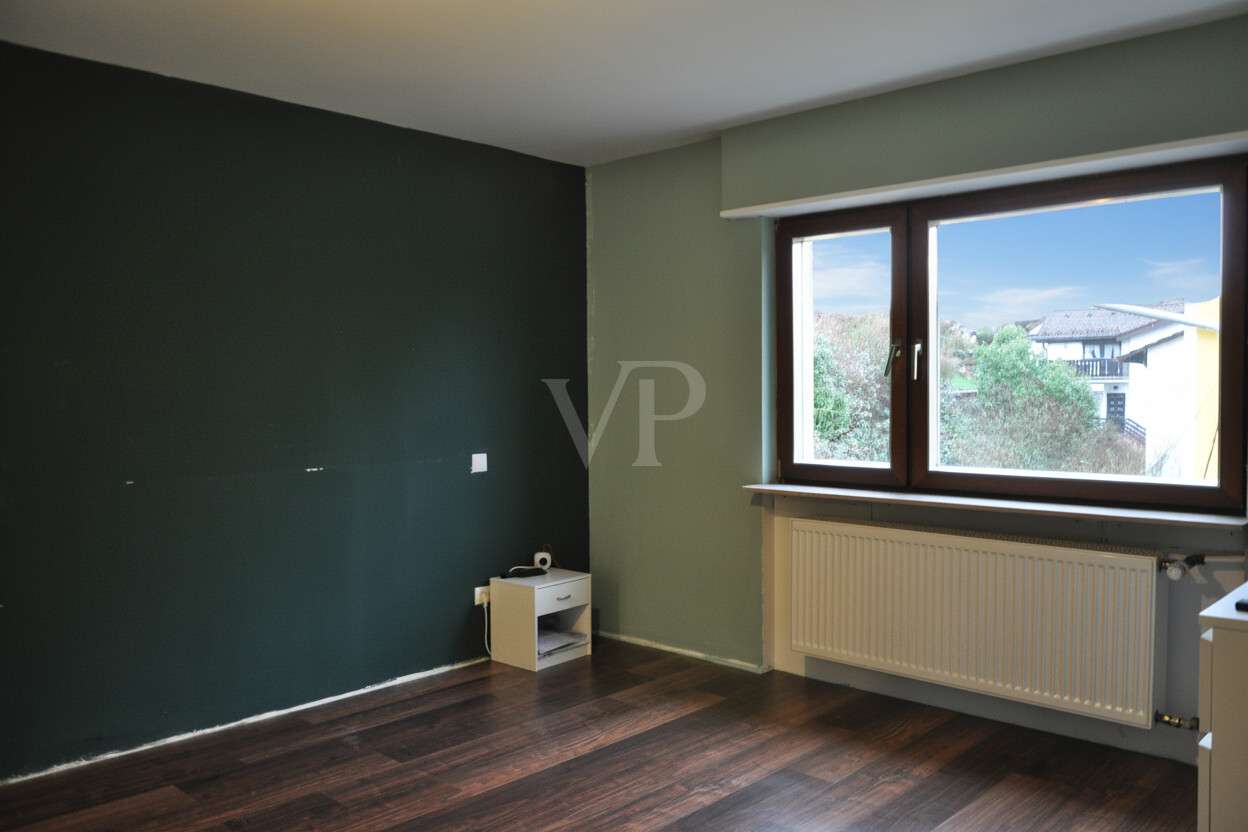 Immobilie in Neckarsteinach - Mehrfamilienhaus mit Burgenblick, großem Garten und Potenzial - Bild 1