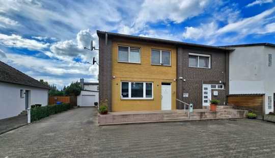 Bild von Gemütliches Zuhause mit Praxisräumen 
und eigenem Garten.