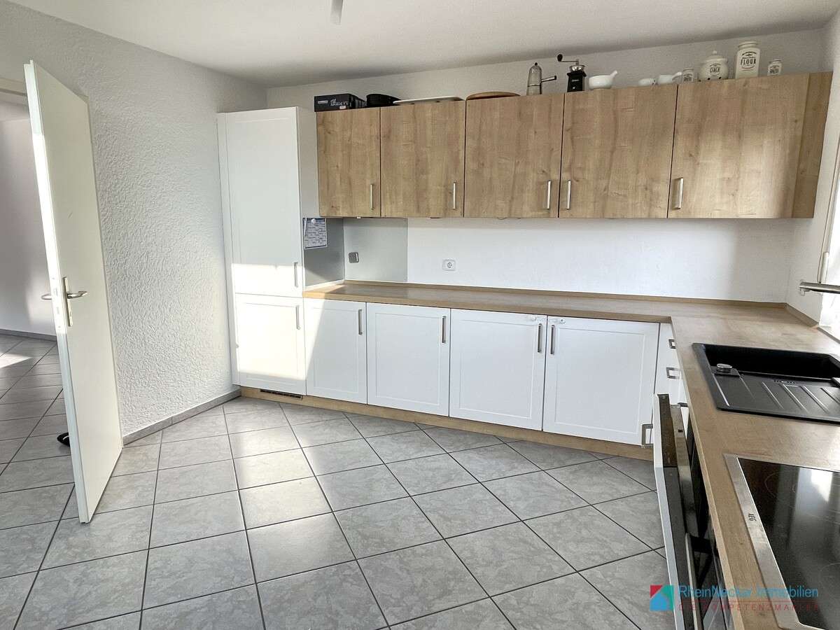 Immobilie in Neulußheim - Moderne und großzügige  Dachgeschosswohnung mit Balkon, beheiztem Hobbyraum, Stellplatz & Garage - Bild 8