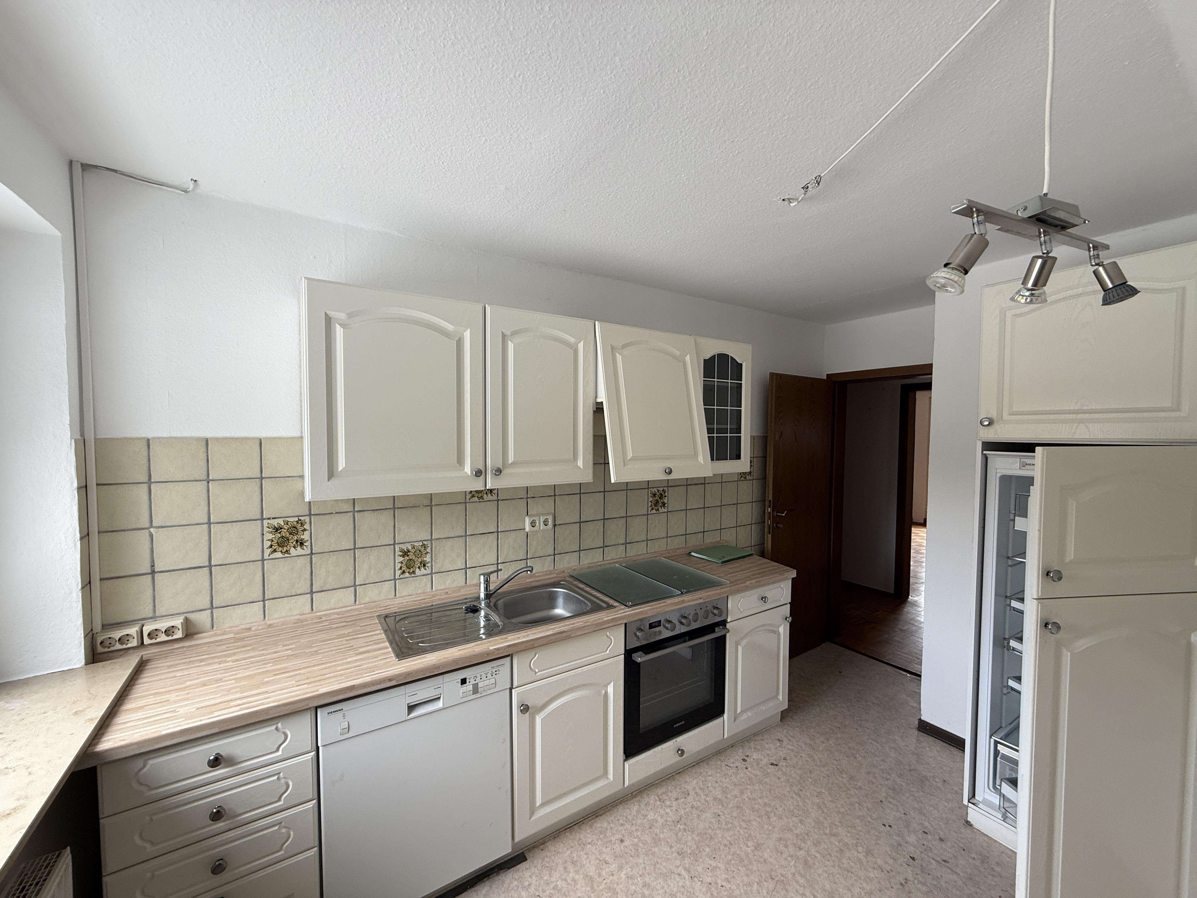 Immobilie in Hatten - Gemütliche 2-Zimmer Eigentumswohnung mit PKW-Stellplatz - Bild 2