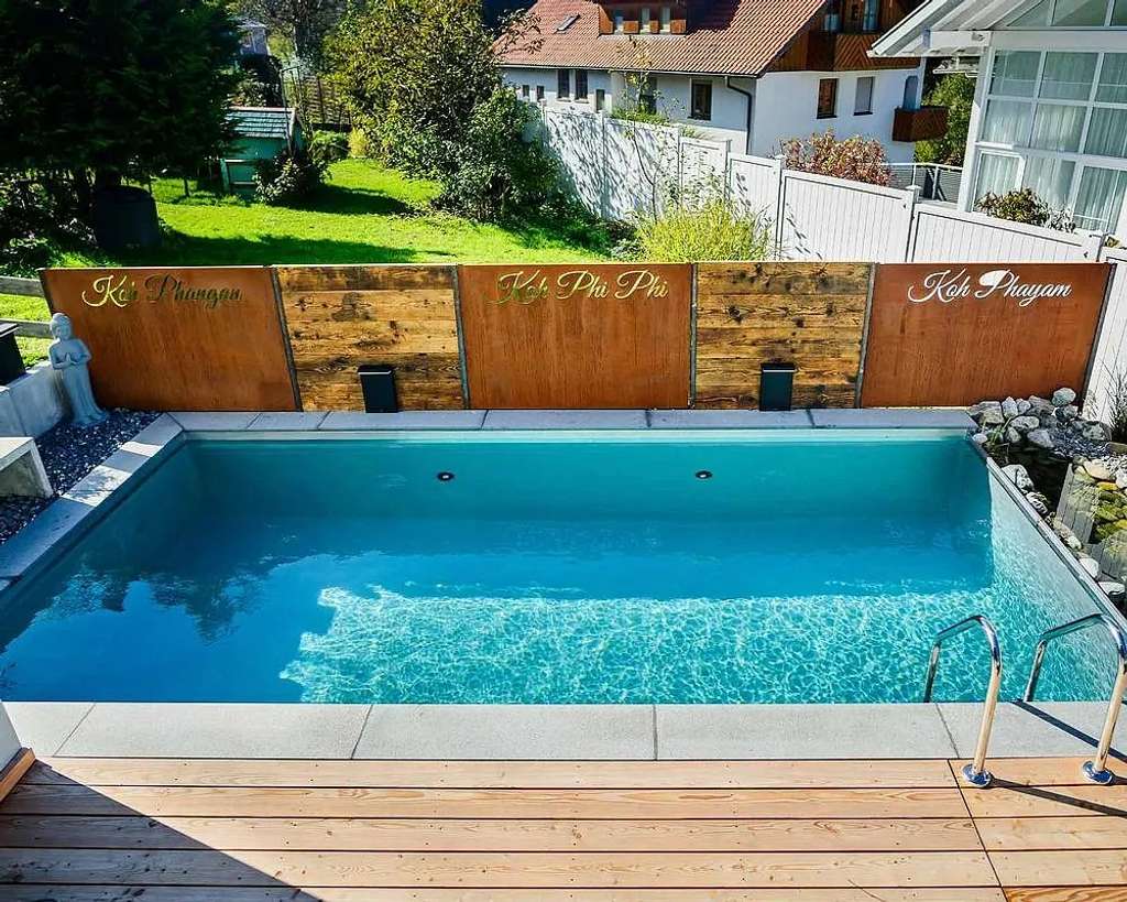 Immobilie in Buchenberg - Einzigartige Doppelhaushälfte mit großer Garage, Wintergarten und Poolanlage - Bild 1