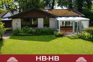 Architekten Bungalow mit Einliegerwohnung auf großem eingewachsenem Grundstück