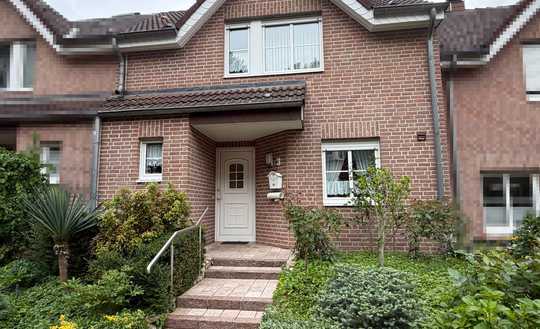 Gepflegtes Reihenmittelhaus mit einer Garage und einem Stellplatz in attraktiver Wohnlage!