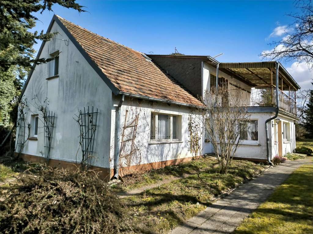 Immobilie in Reichenow-Möglin - Geräumiges Wohnhaus auf großem Grundstück mit Baureserve bietet vielfältige Nutzungsmöglichkeiten - Bild 1