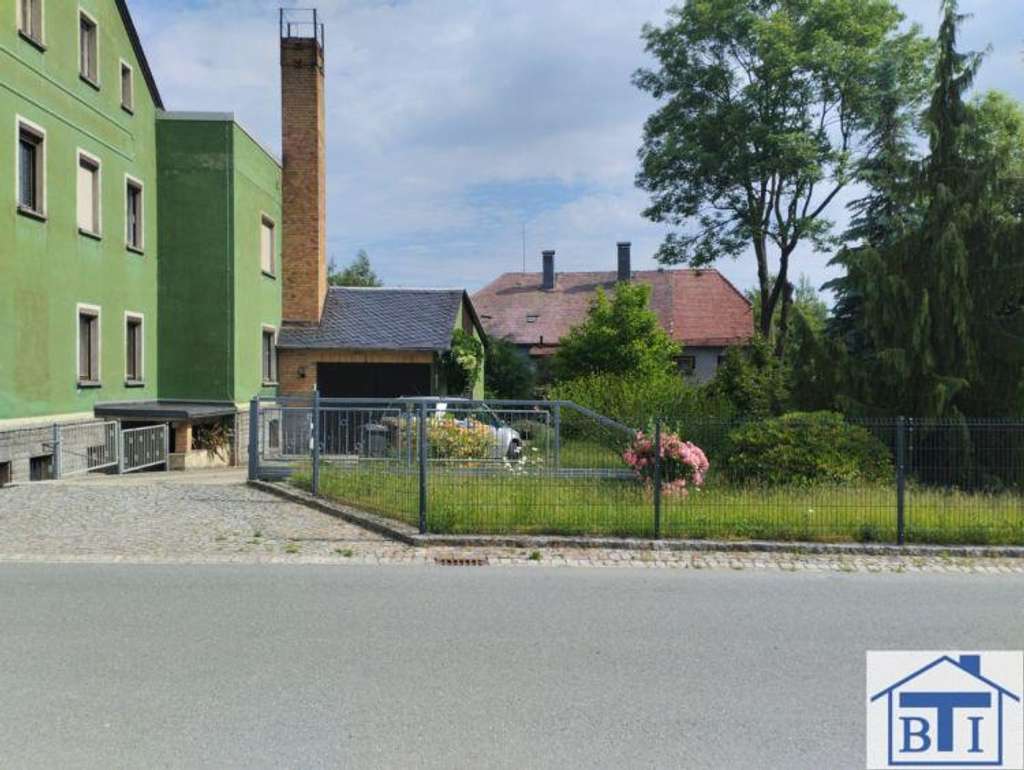 Immobilie in Ebersbach-Neugersdorf - Wohn- und Geschäftshaus mit Potenzial und beziehbarer Wohnung - Bild 1