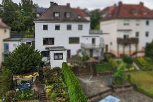 VERKAUFT: Vermietete Doppelhaushälfte mit Südgarten und Zierteich in Bad Hersfeld – Die vollständige Adresse der Immobilie erhältst du vom Anbieter., 36251 Bad Hersfeld – Vorschaubild 3