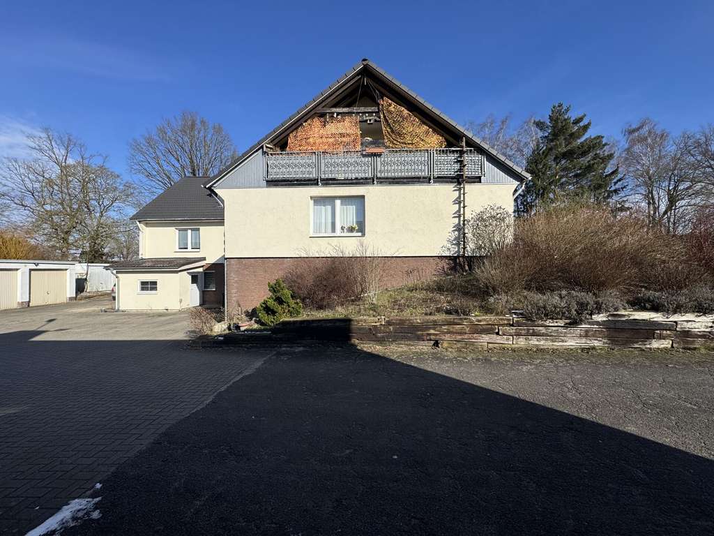 Immobilie in Adelheidsdorf - 7 Parteien Mehrfamilienhaus mit 11 Garagen in Adelheidsdorf - Bild 4