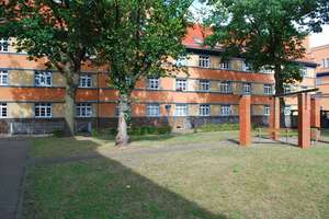 Mit Balkon und kinderfreundlichen Innenhof