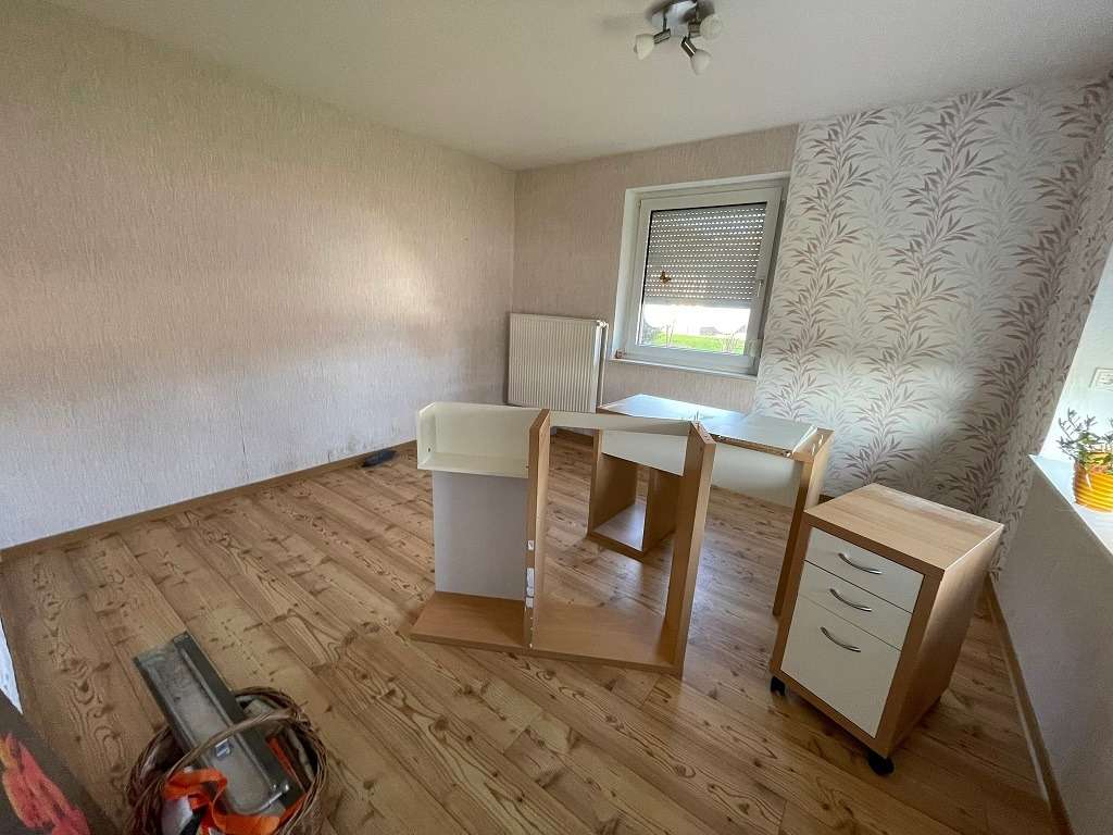 Immobilie in Moormerland - Gepflegte Doppelhaushälfte mit großem Grundstück und Entwicklungspotenzial - Bild 4