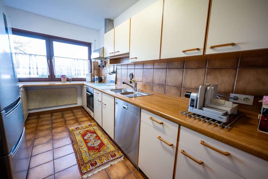 Immobilie in Wörrstadt - Wohnen wie im Haus: Gartenwohnung mit Kamin, Terrasse, großem Keller & Garage! Jetzt verlieben! - Bild 4