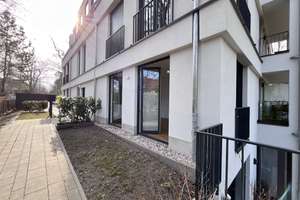 Möbliertes Neubau-Apartment in FU-Nähe mit kleinem Garten